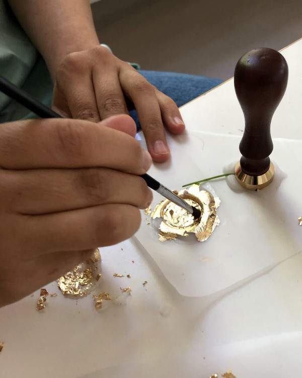 Gestaltung von Merchandise mit Blattgold